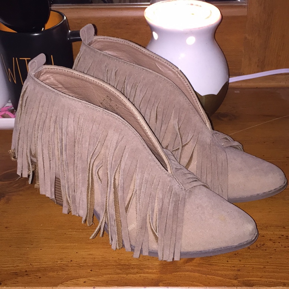 Beast fashion fringe booties
